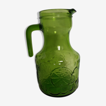 Pitcher carafe with orangeade of Italy in green glass