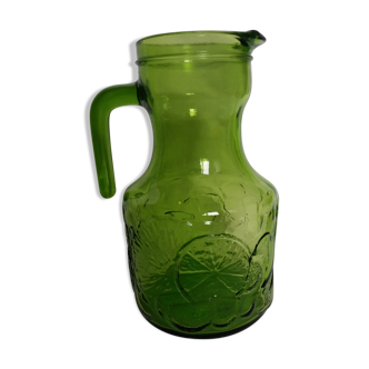 Pitcher carafe with orangeade of Italy in green glass