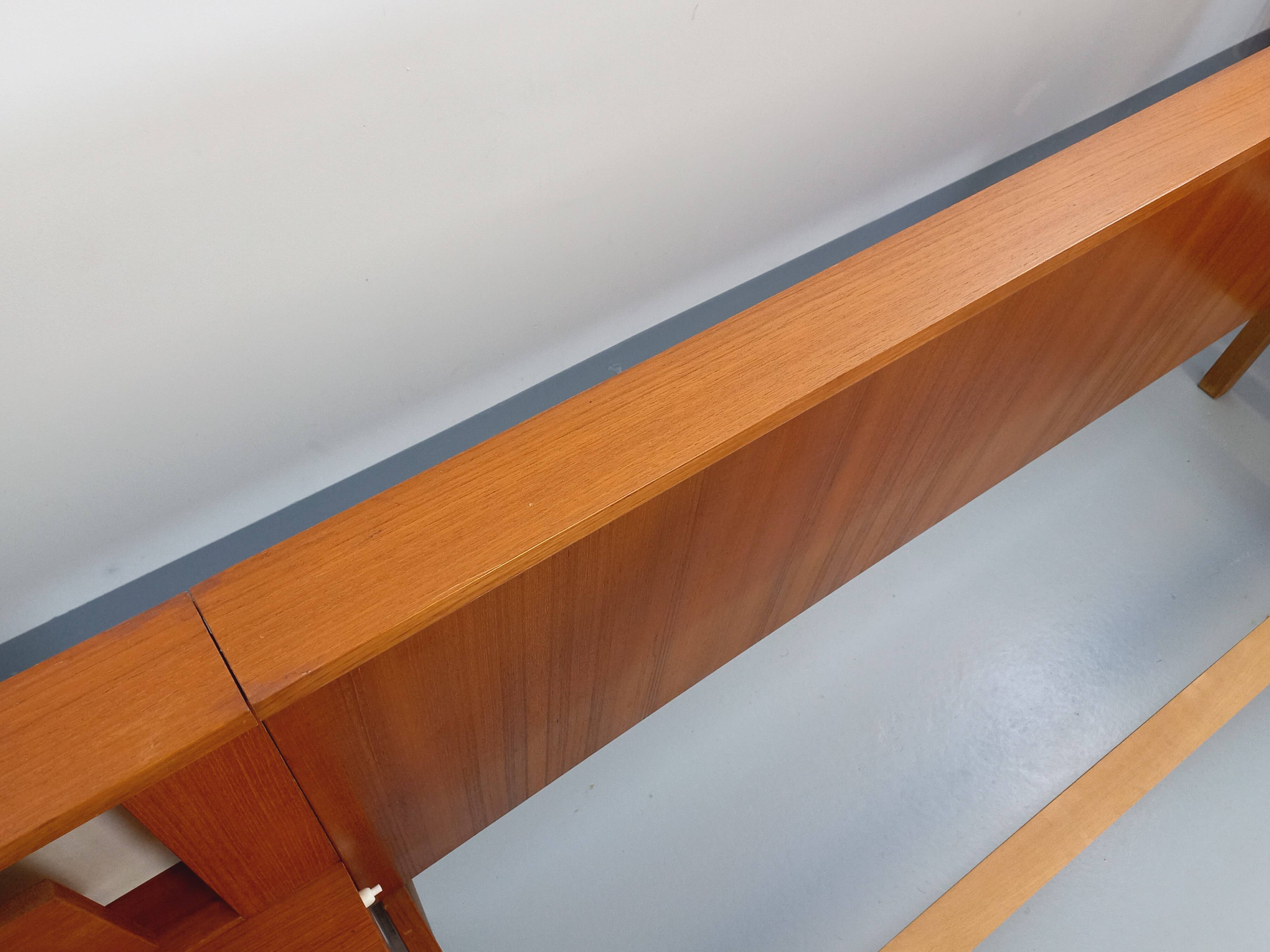 Vintage Scandinavian style double bed in teak from the 60s with integrated bedside lights