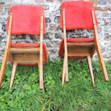 2 old red 'moumoute' chairs