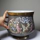Large antique cache-pot in glazed porcelain, rockwork decoration with a bird, 19th century.