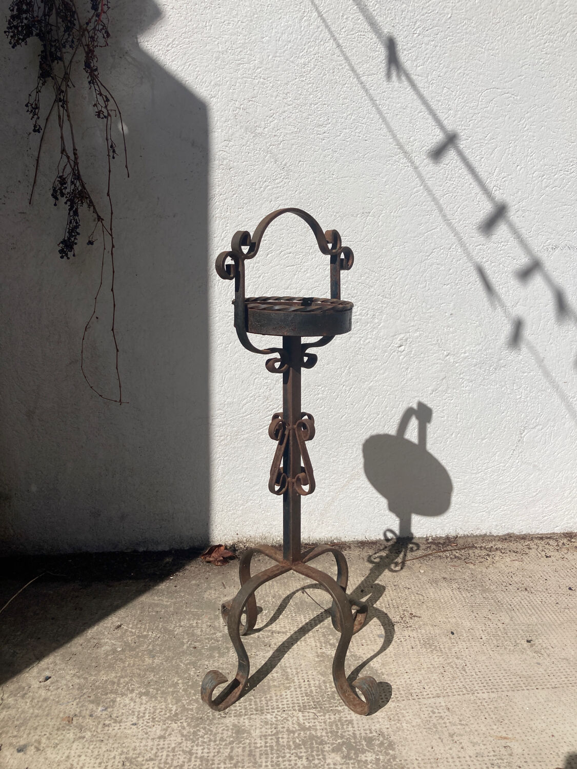 Porte plante en fer forgé
