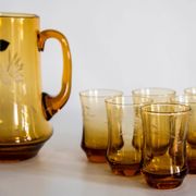 Set of six mid-century glasses and yellow Murano pot, Europe, 1960s.