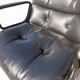 Charles Pollock Executive Knoll office chair in black leather.