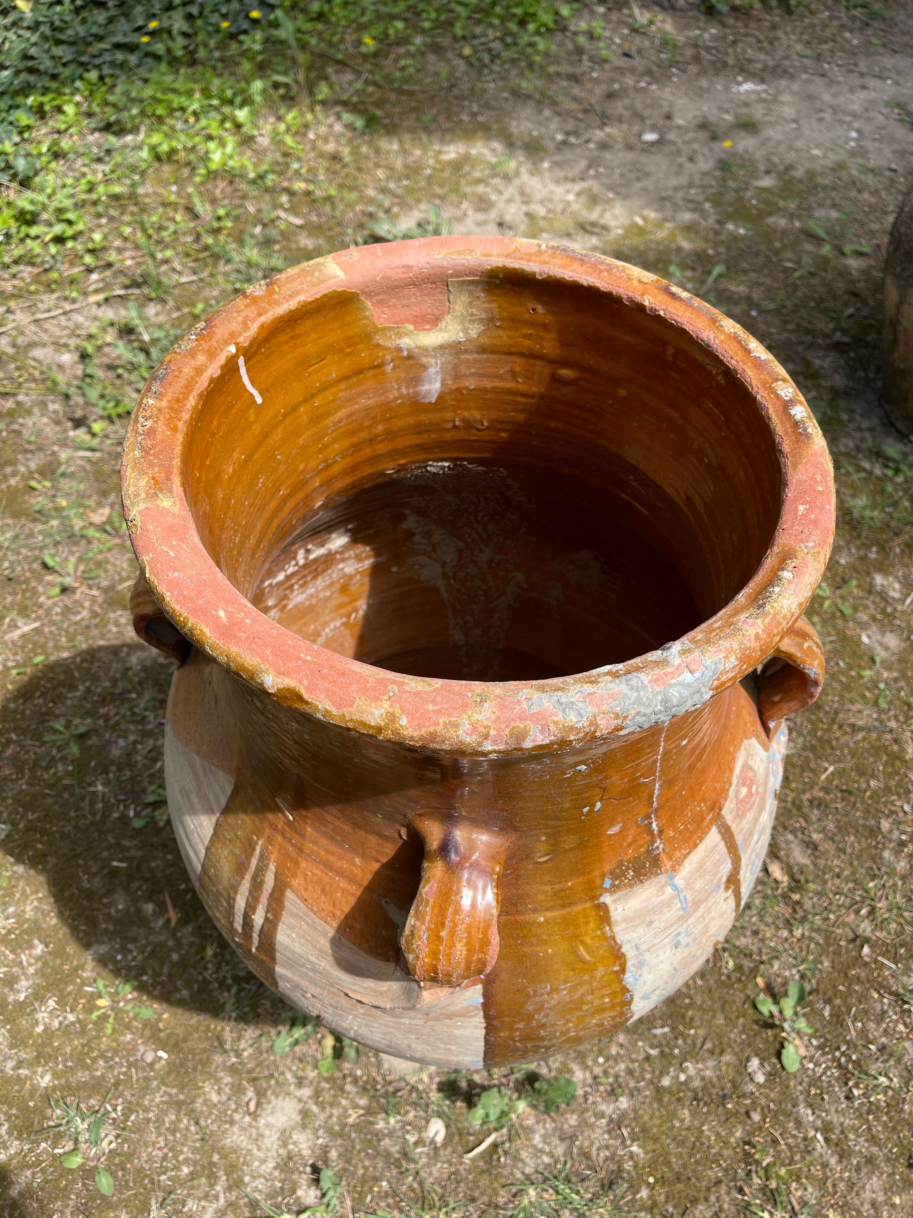 Ancient terracotta pottery jar