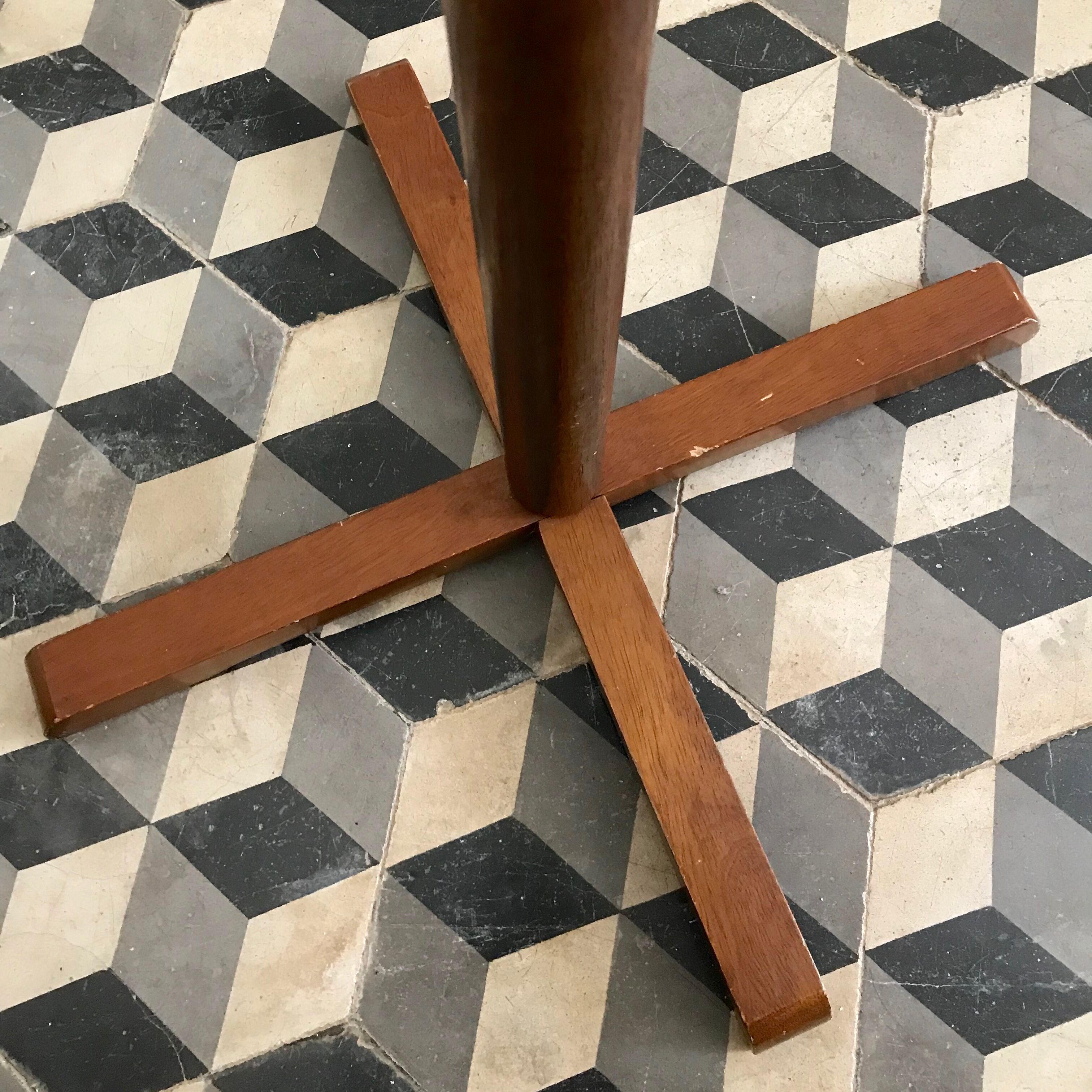 Wooden coat rack on foot