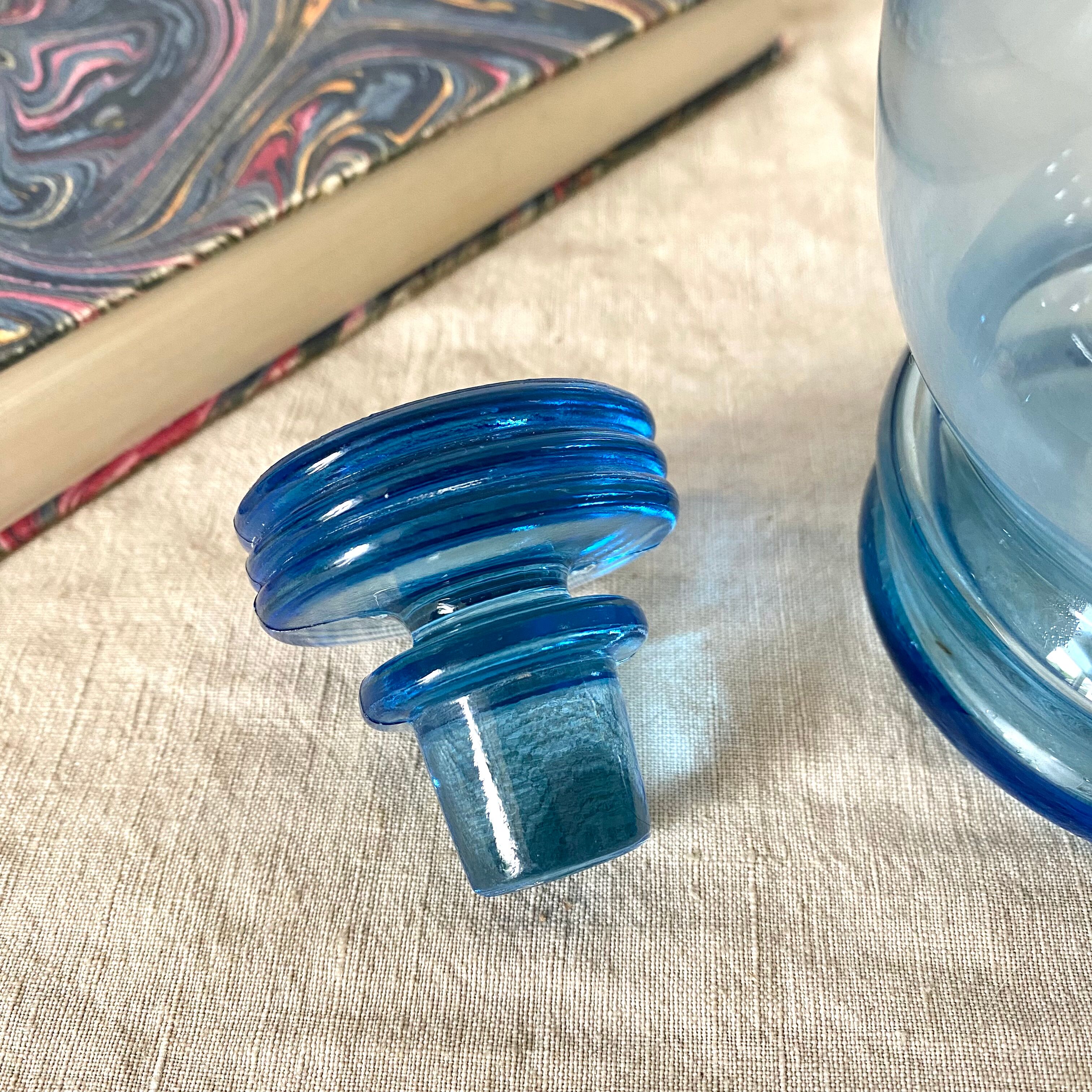 Antique carafe in blue glass