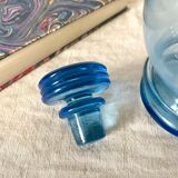 Antique carafe in blue glass