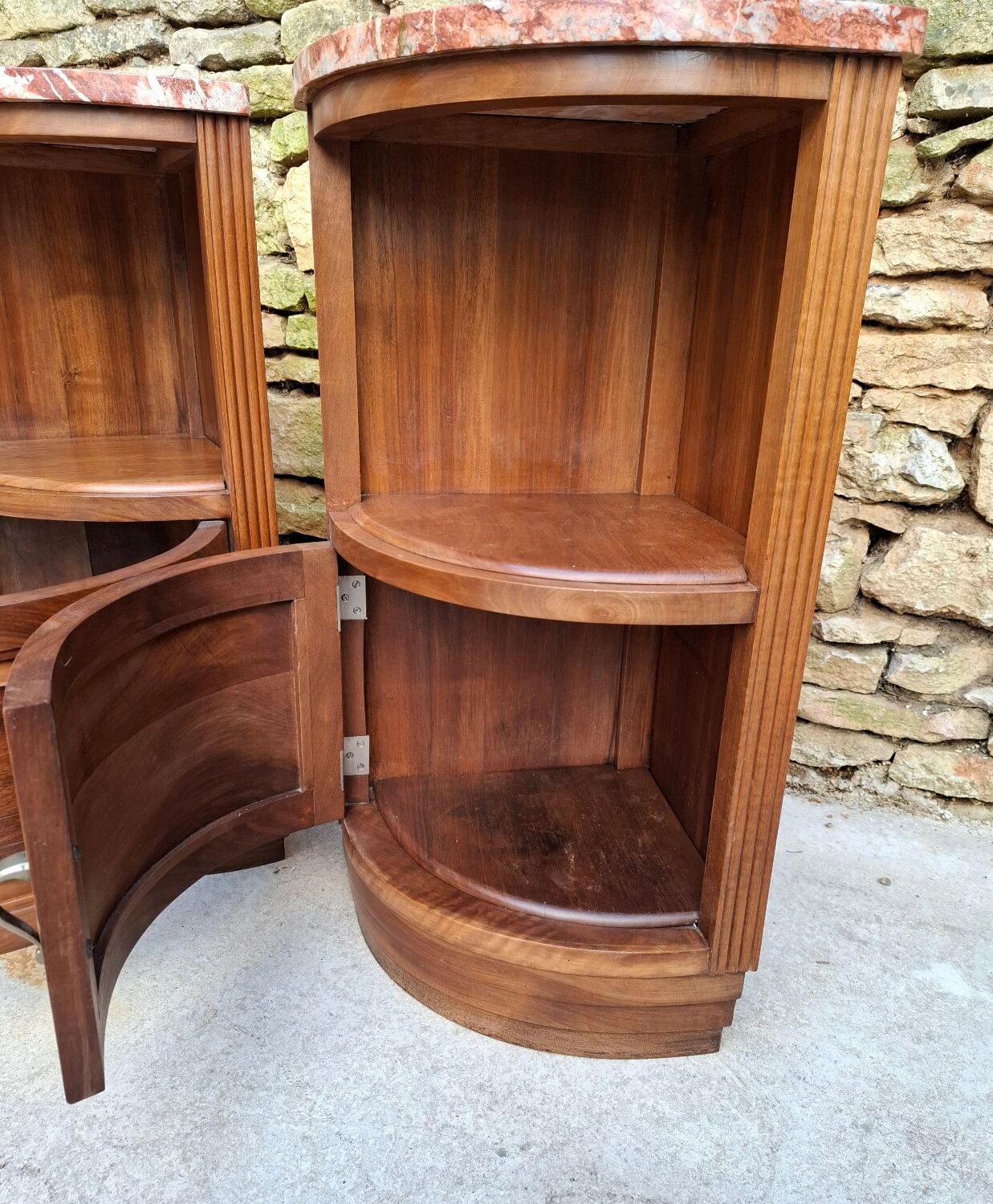 Corner bedside tables, in walnut
