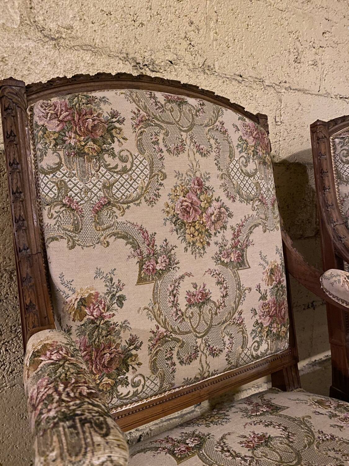 Pair of antique carved wooden armchairs