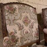 Pair of antique carved wooden armchairs