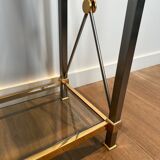 Console de style néoclassique en laiton doré et patine canon de fusil attribuée à la Maison Jansen