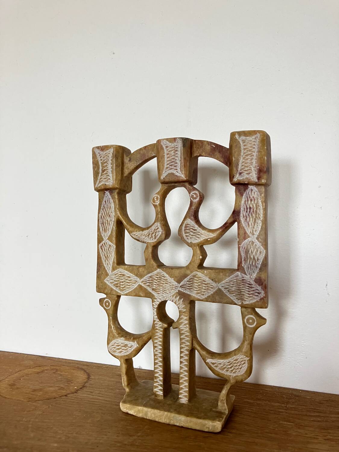 Vintage stone folk art candle holder