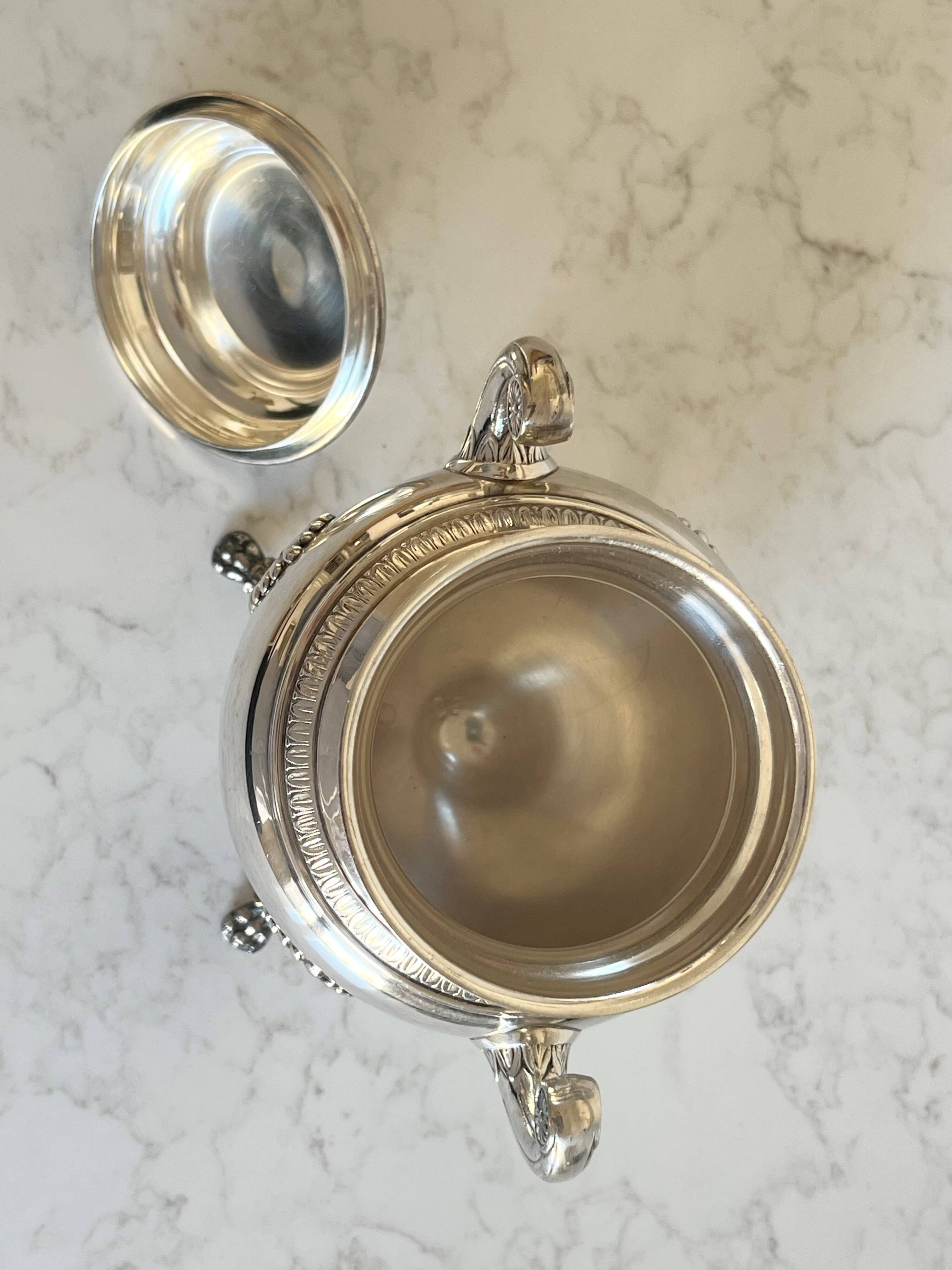 Ravinet d’Enfert silver-plated sugar bowl resting on 4 claw feet, Emp-style palmette motif