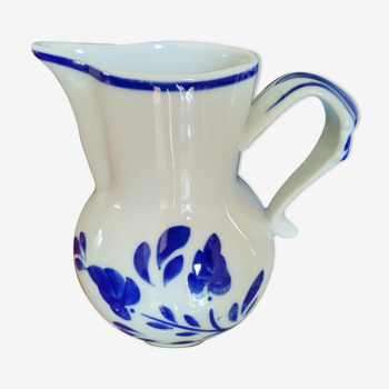 White and blue pitcher