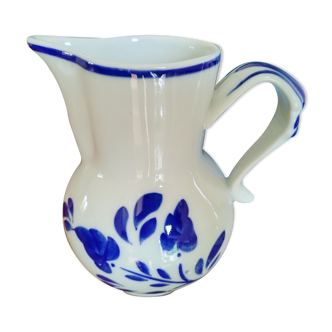 White and blue pitcher