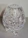 Tripod crystal vases in the shape of an egg.