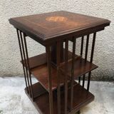Revolving english library in mahogany, wheeled footing