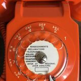 Orange vintage dial phone