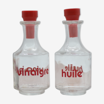 Oil and vinegar with red writing