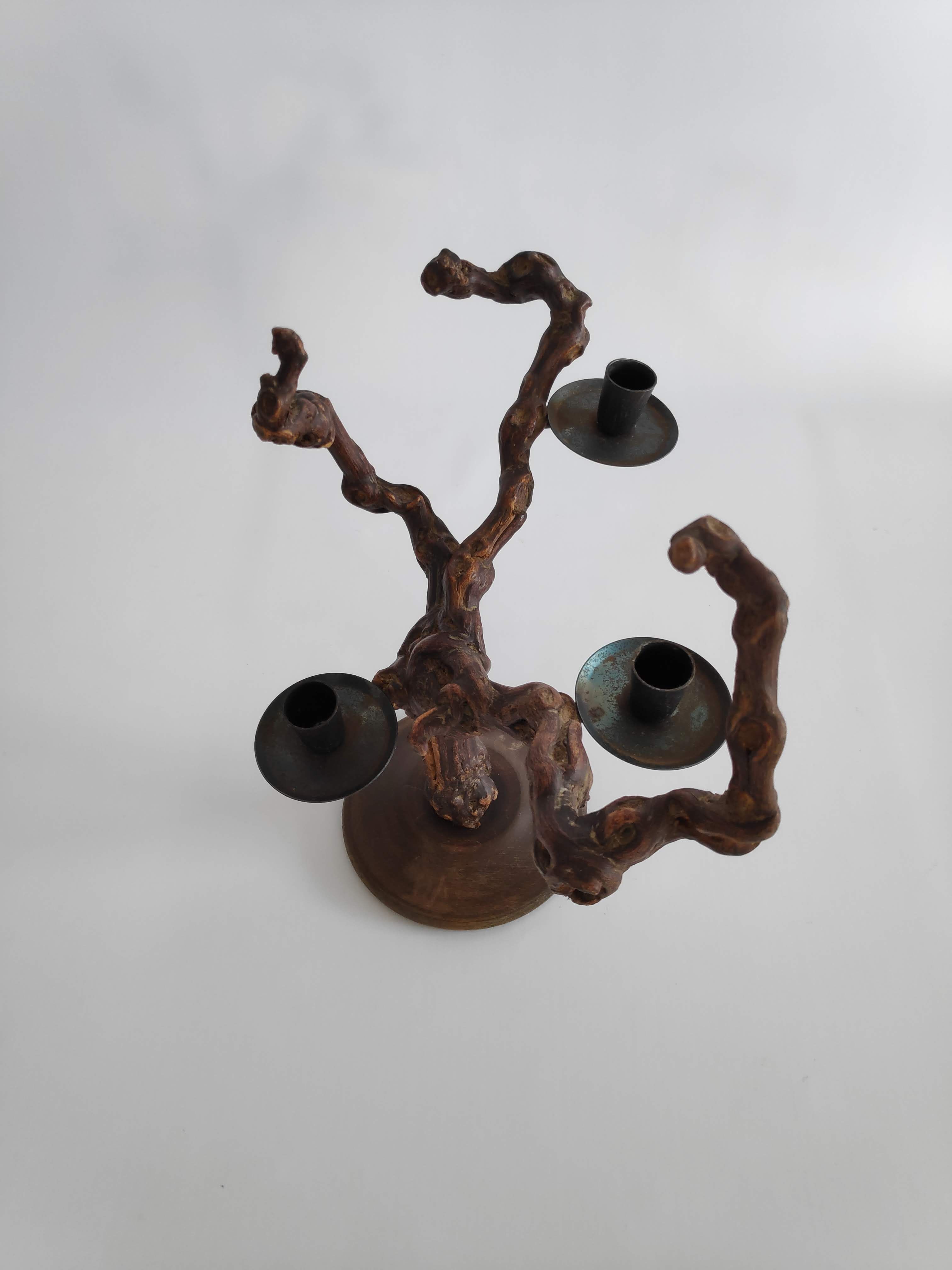 Vintage candlestick in vine shoots of the years 70