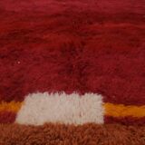 Minimalist burgundy cherry red shaggy berber rug