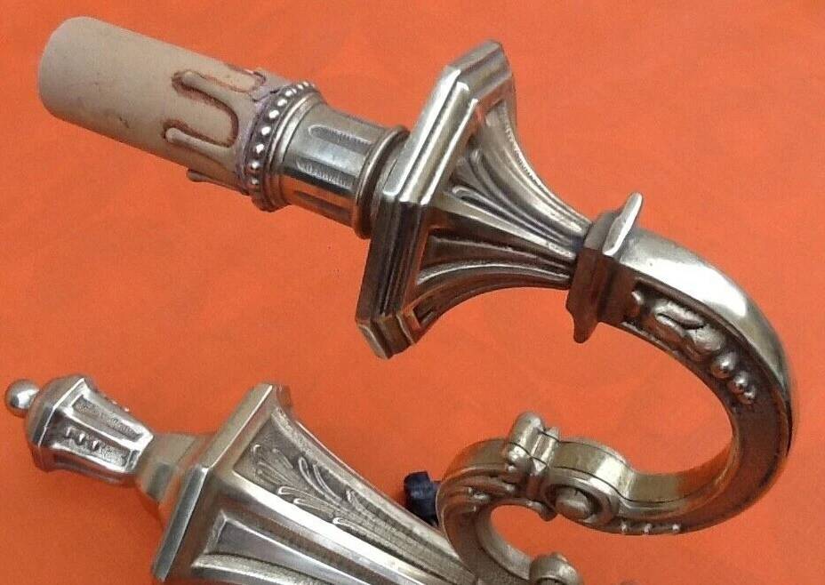 Large wall sconce in LXV style, patinated bronze.