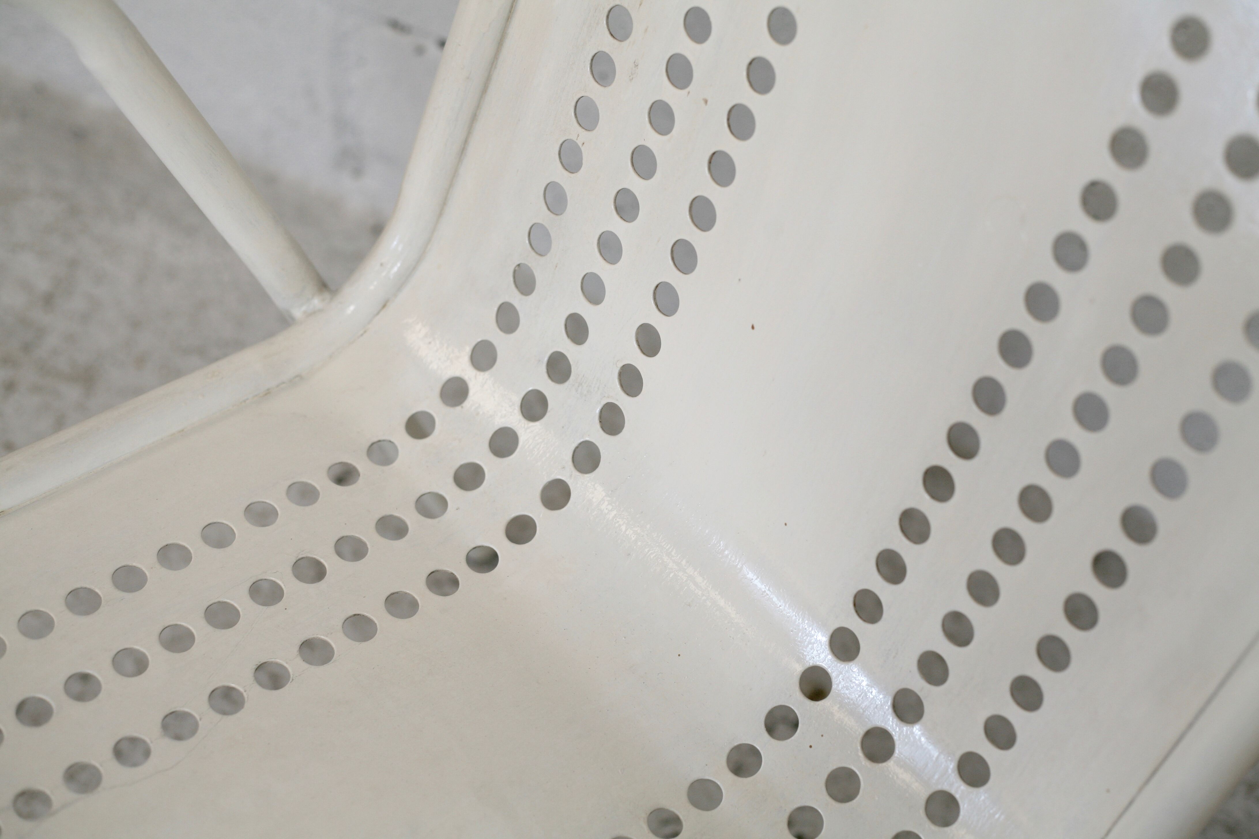 Pair of honeycomb steel armchairs. France, circa 1950.