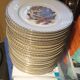 Lot de 24 assiettes plates scènes de gibiers