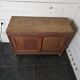 Antique oak sideboard with sliding doors
