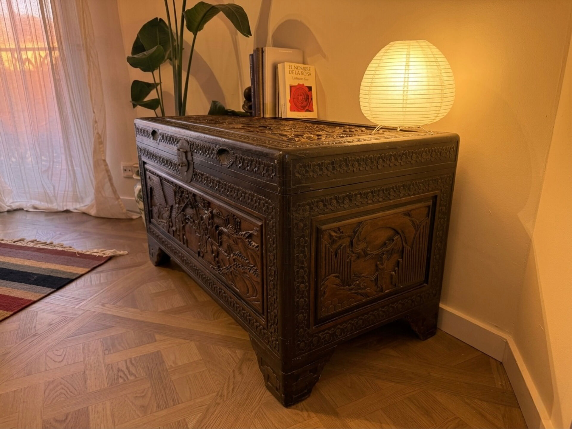 Chinese camphor wood chest, hand-carved, with rider decoration.