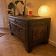 Chinese camphor wood chest, hand-carved, with rider decoration.