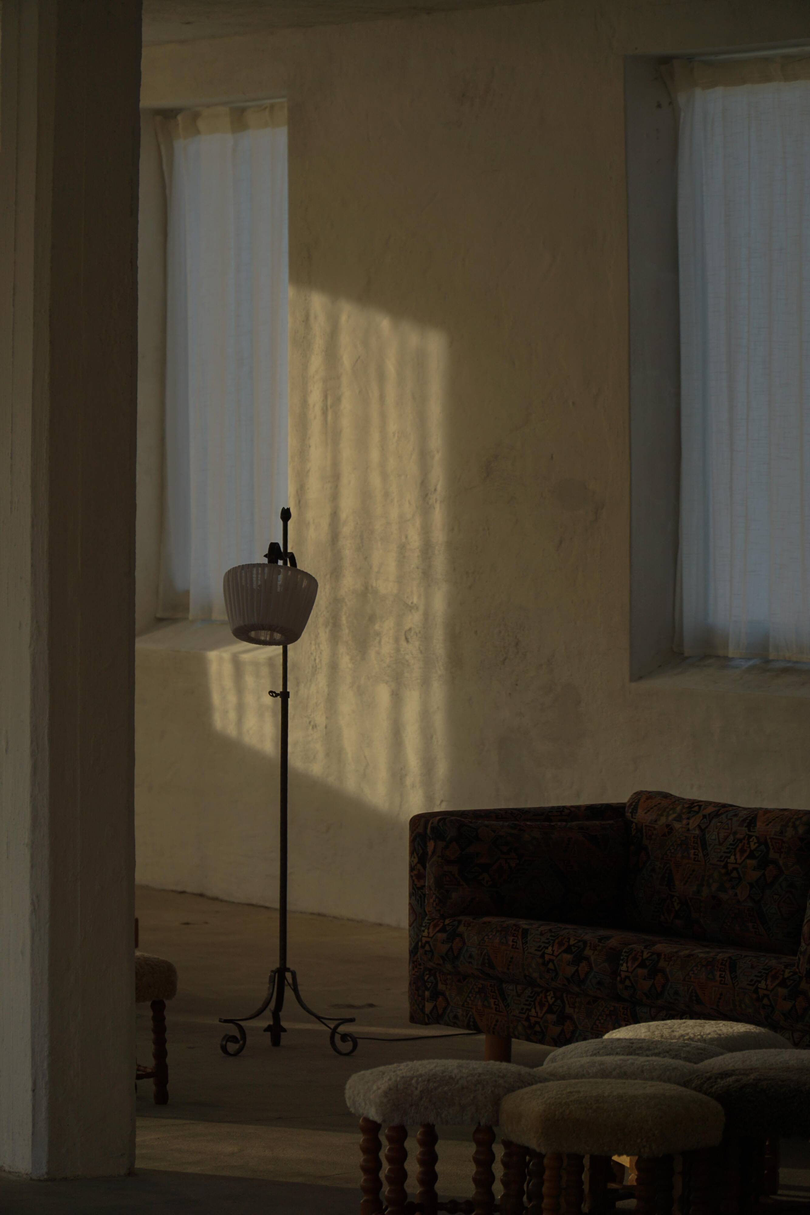 20th-century wrought iron floor lamp with swirling detail, Danish Art Deco.