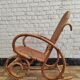 Vintage rocking chair in rattan and cane.