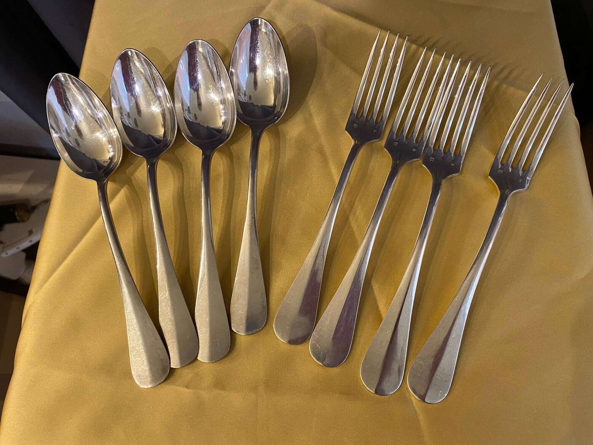 Series of 4 silver metal cutlery uniplat net model spoons forks