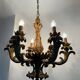 Lustre style Hollywood Regency années 70 bois sculpté
