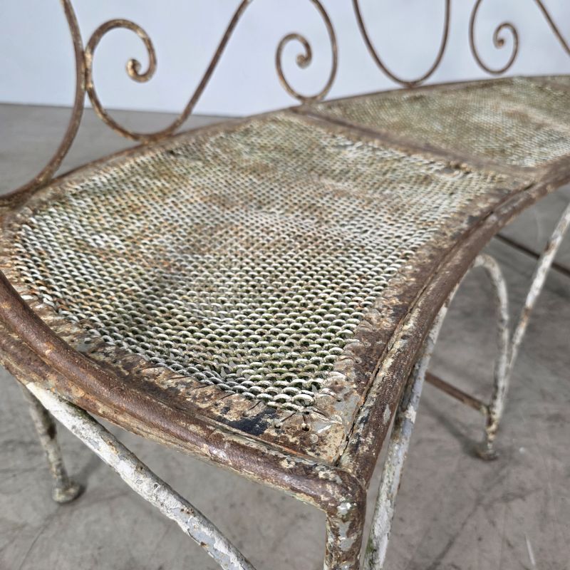 Beautiful curved garden bench from the late 19th century in iron.