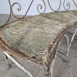 Beautiful curved garden bench from the late 19th century in iron.