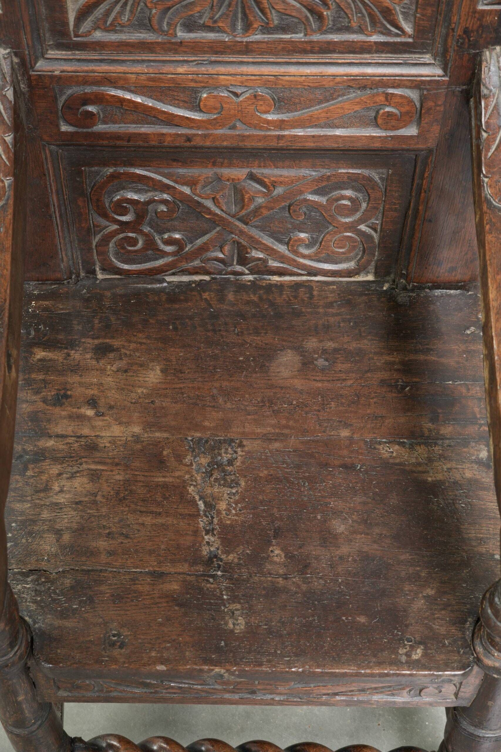 Unique 18th-century English oak wainscot chair with amazing woodcarving