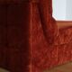 Rusty velvet low chair without arms