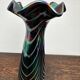 Vintage iridescent glass vase with ribbed design and ruffled neck, H 21 cm.