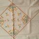 Hand-embroidered yellow square tablecloth.