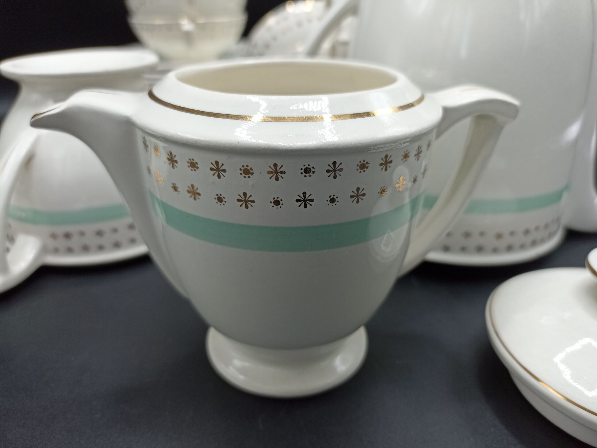 Tea set stars and mint green in semi-porcelain