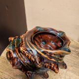 The shell-shaped trinket dish in Vallauris style.