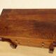 Antique chest of drawers with cross motifs, made entirely of solid walnut.