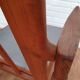 A pair of Danish armchairs, teak, wool, leather