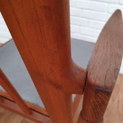 A pair of Danish armchairs, teak, wool, leather