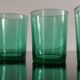 Set of 4 emerald green water glasses from Huile Lesieur