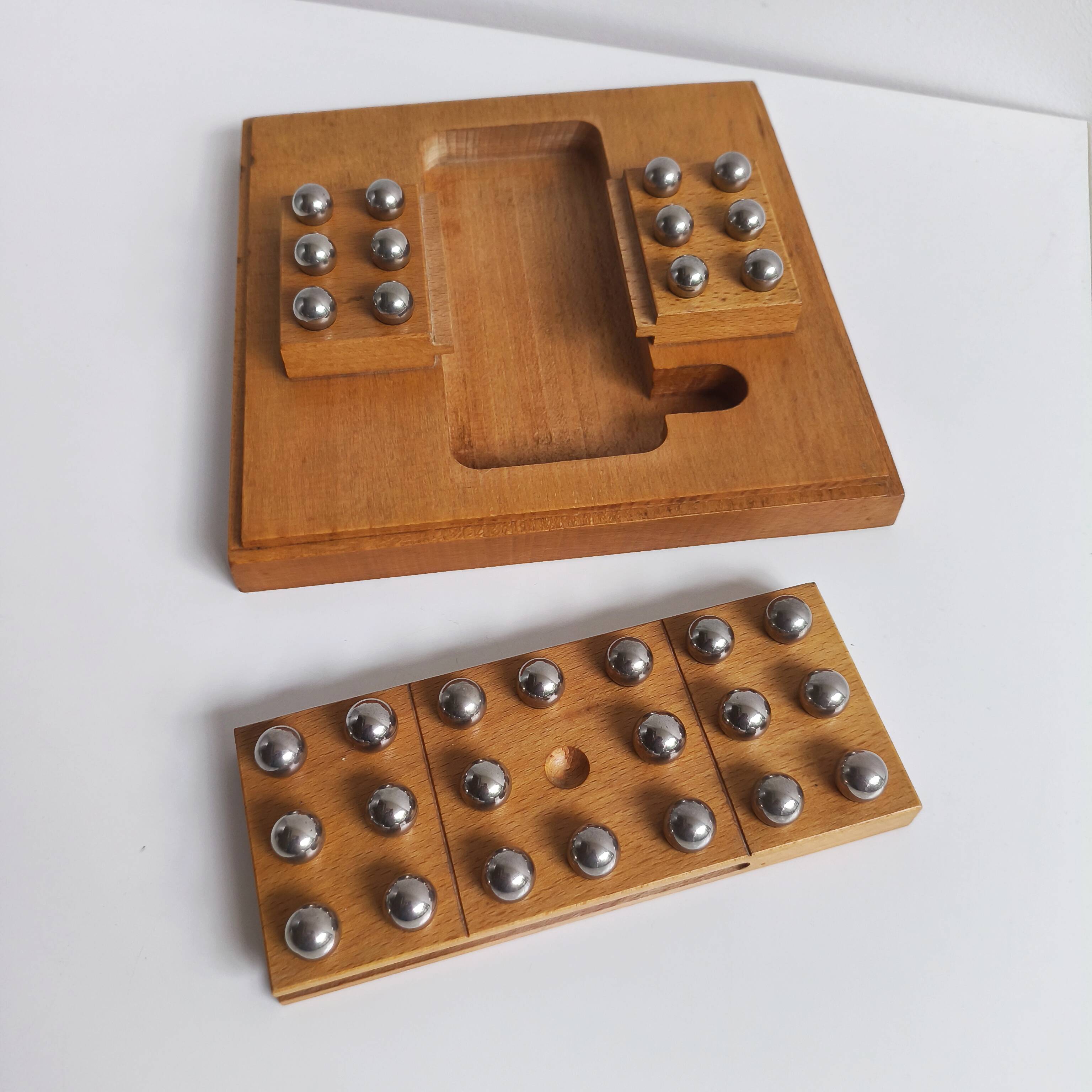 Solid wood and chrome steel solitaire game
