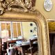 Gold sculpted and moulded stucco trumeau mirror 113 x 78 cm